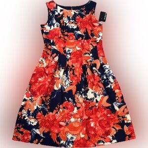 EnFocus 16 Sleeveless pleated Navy Dress with bold Red and Orange Floral Print